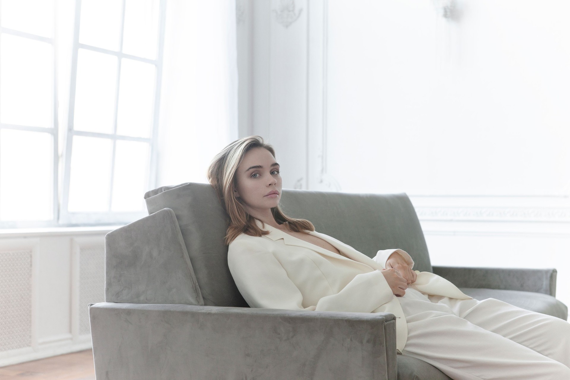 Luxury lifestyle Beautiful young woman in Parisian apartment Looks gorgeous